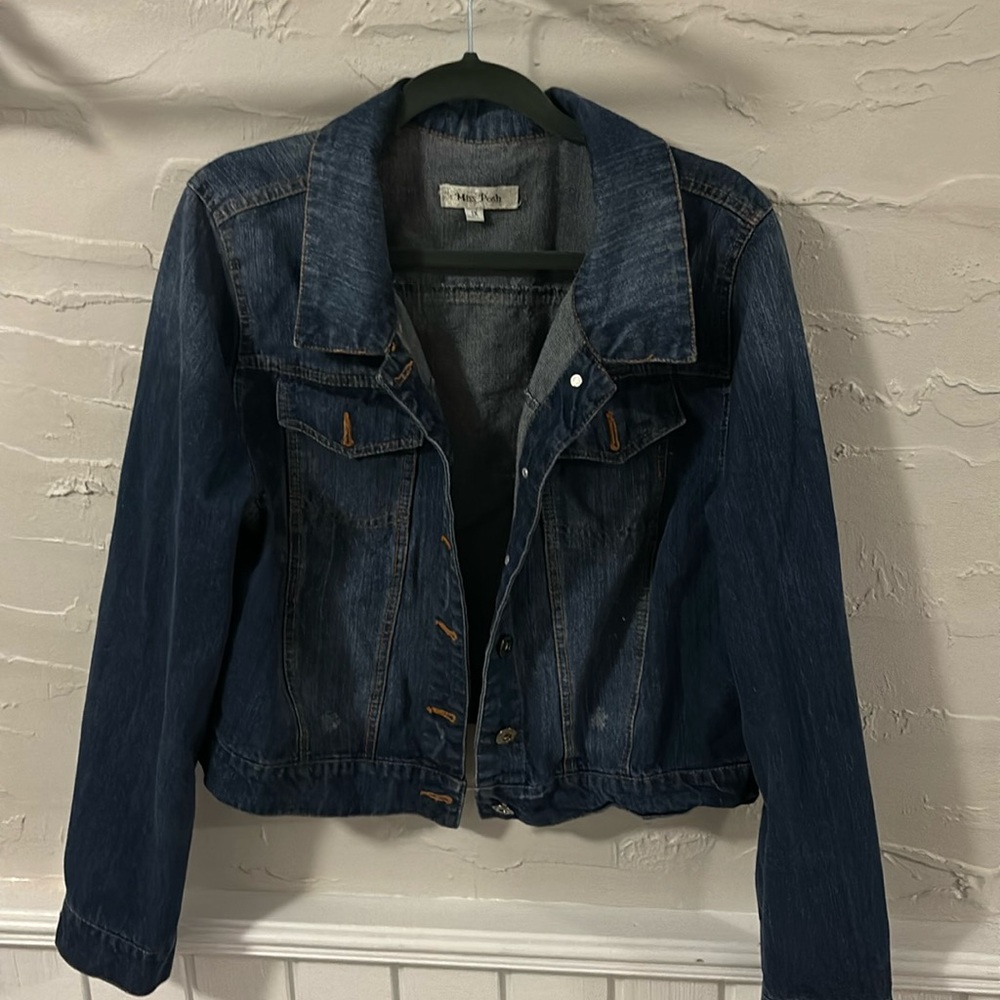 Distressed denim jacket